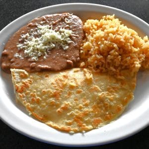 Kids #4. Quesadilla served with rice and beans.